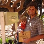 Toby with Maverick and award