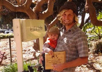Toby with Maverick and award
